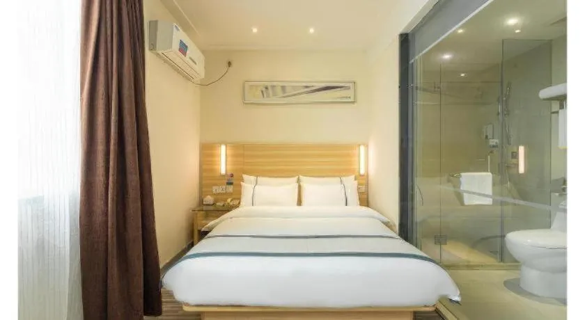 Bed in City Comfort Inn Ezhou Wenxing Avenue Central Hospital