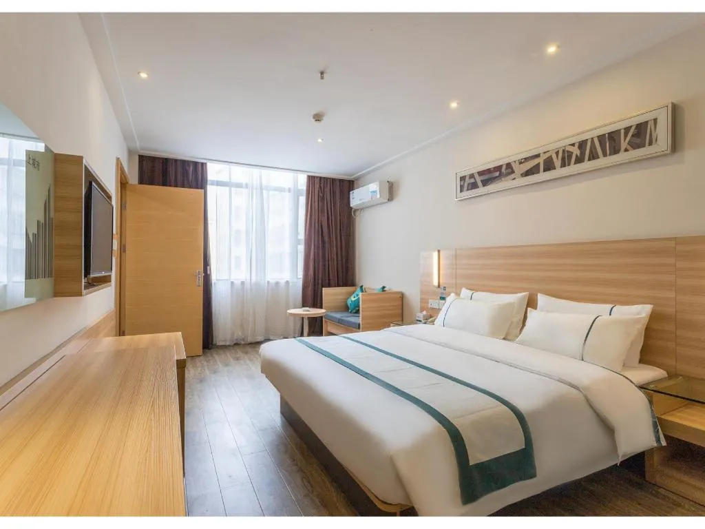 Bed in City Comfort Inn Ezhou Wenxing Avenue Central Hospital