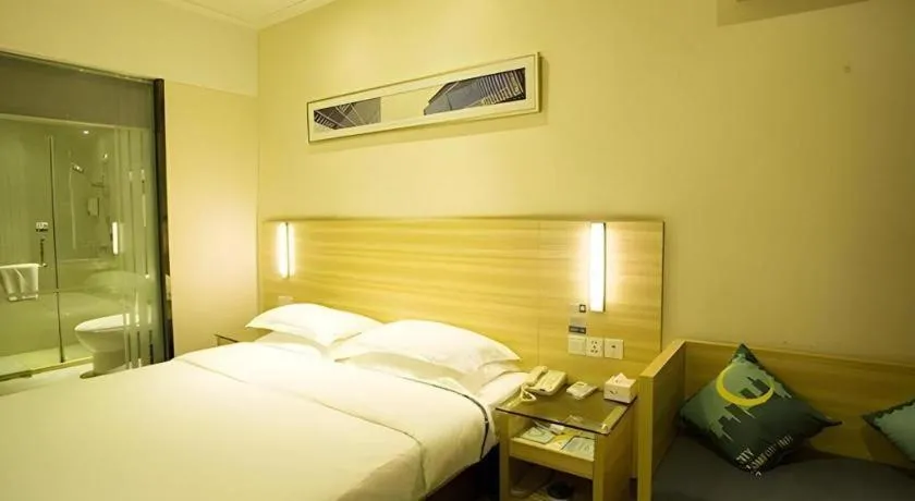 Bed in City Comfort Inn Ezhou Wenxing Avenue Central Hospital