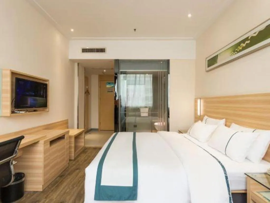 Bed in City Comfort Inn Ezhou Wenxing Avenue Central Hospital
