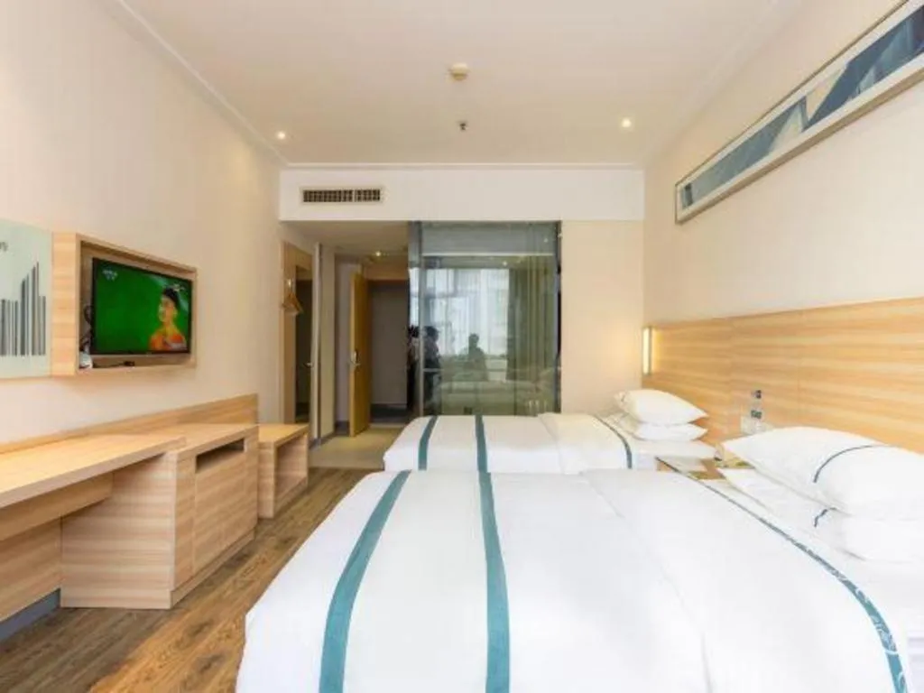 Bed in City Comfort Inn Ezhou Wenxing Avenue Central Hospital