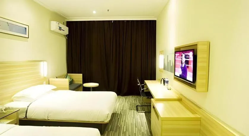 Bed in City Comfort Inn Ezhou Wenxing Avenue Central Hospital