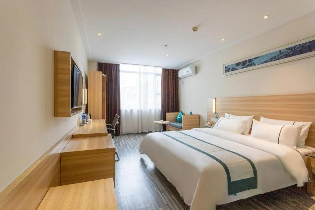 Bed in City Comfort Inn Ezhou Wenxing Avenue Central Hospital