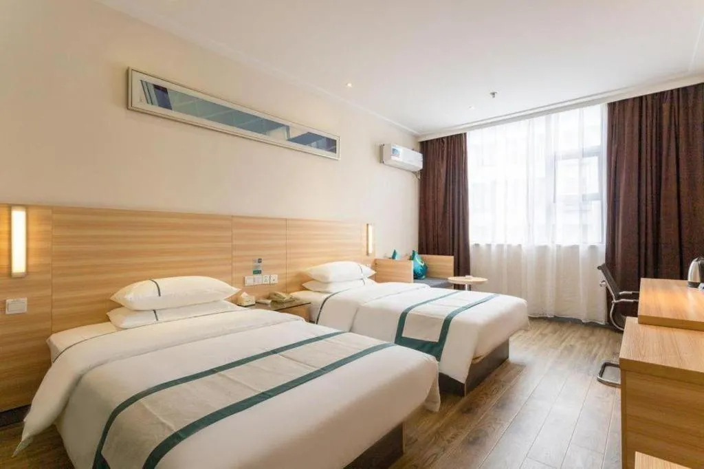 Bed in City Comfort Inn Ezhou Wenxing Avenue Central Hospital