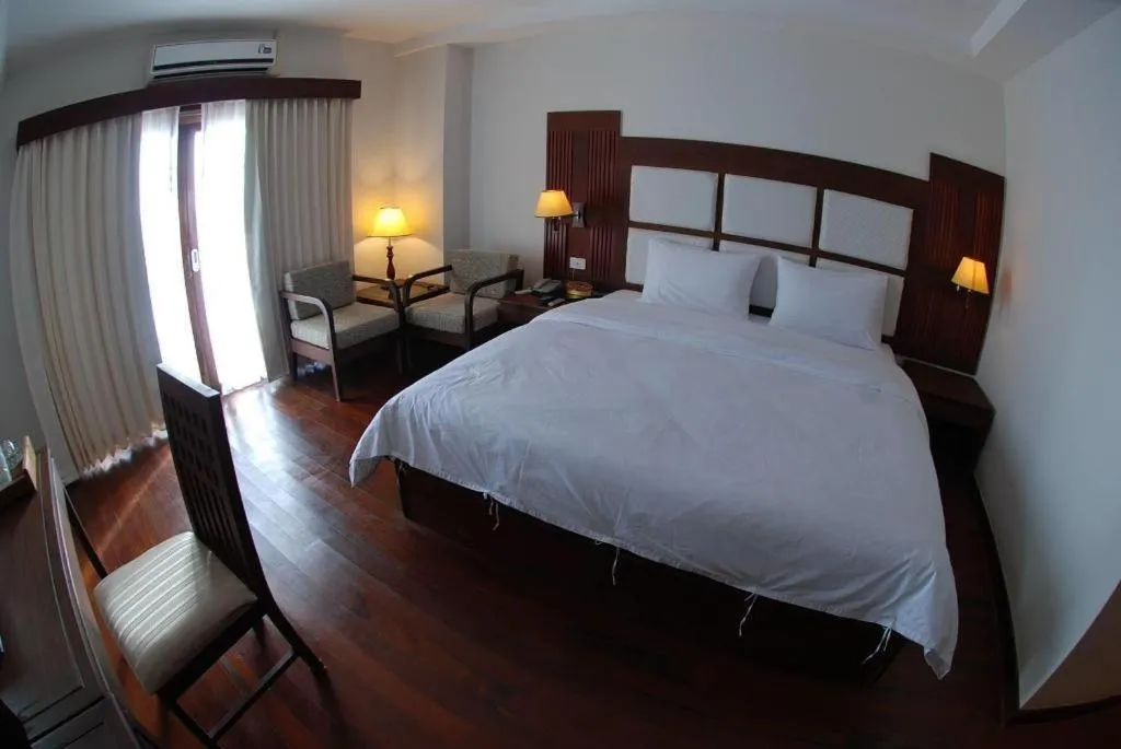 Bed in River City Hotel