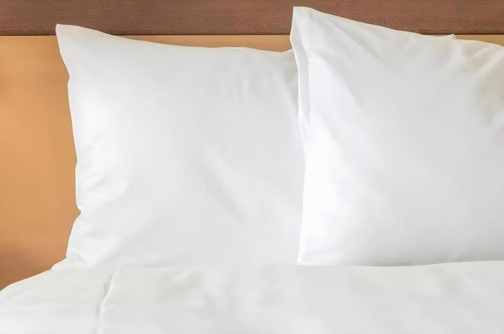 Bed in River City Hotel