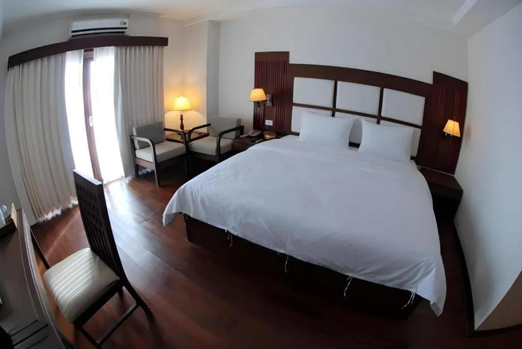 Bed in River City Hotel