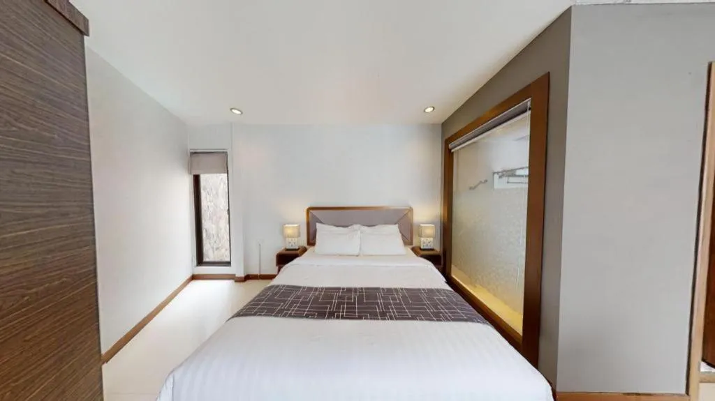 Bed in Sawana Suites
