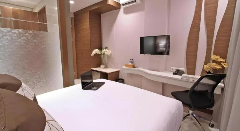 Bed in Sawana Suites