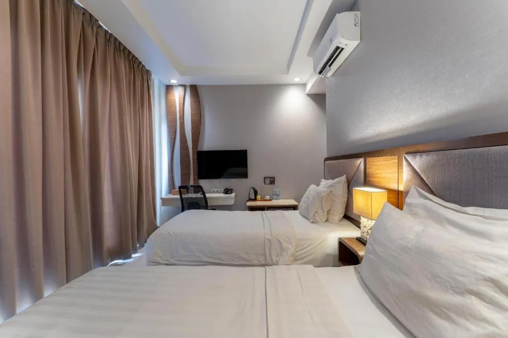 Bed in Sawana Suites