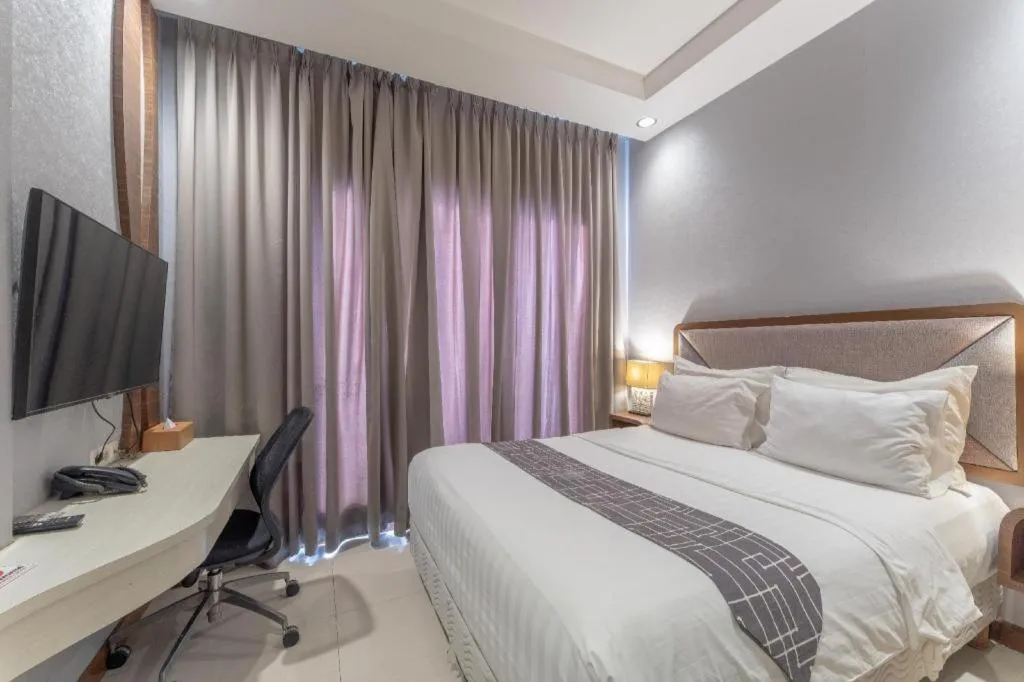 Bed in Sawana Suites