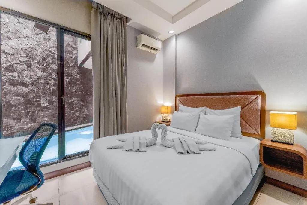 Bed in Sawana Suites