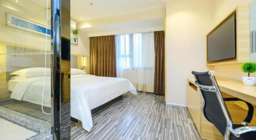 Bed in City Comfort Inn Meishan Sansu Temple