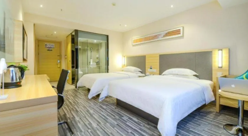 Bed in City Comfort Inn Meishan Sansu Temple