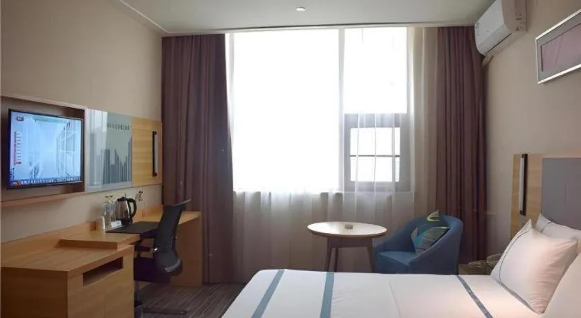 Bed in City Comfort Inn Meishan Sansu Temple