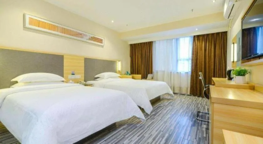 Bed in City Comfort Inn Meishan Sansu Temple