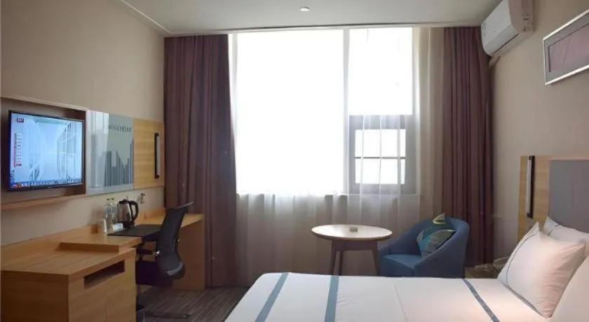 Bed in City Comfort Inn Meishan Sansu Temple