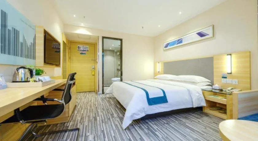 Bed in City Comfort Inn Meishan Sansu Temple