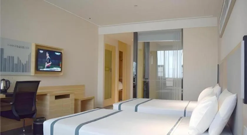 Bed in City Comfort Inn Meishan Sansu Temple