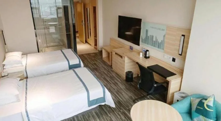 Bed in City Comfort Inn Meishan Sansu Temple