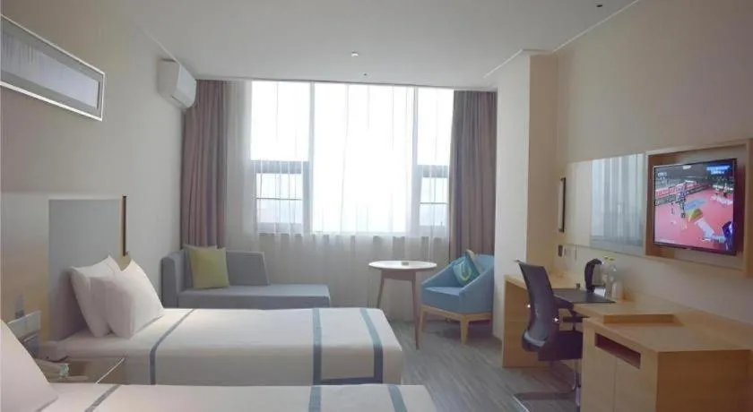 Bed in City Comfort Inn Meishan Sansu Temple