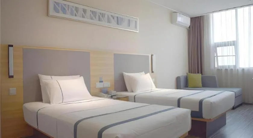 Bed in City Comfort Inn Meishan Sansu Temple