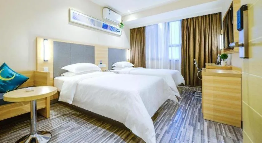 Bed in City Comfort Inn Meishan Sansu Temple