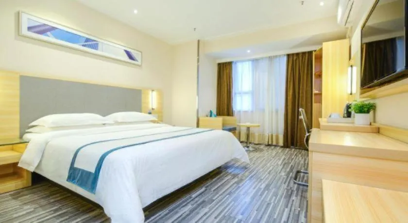 Bed in City Comfort Inn Meishan Sansu Temple