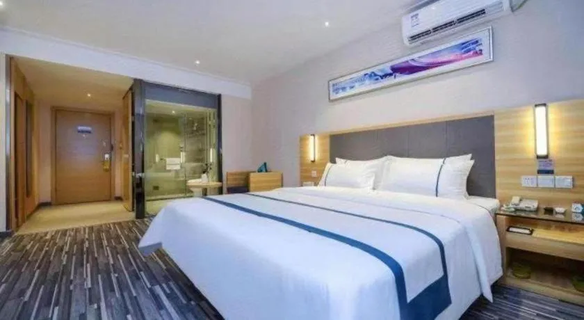 Bed in City Comfort Inn Meishan Sansu Temple