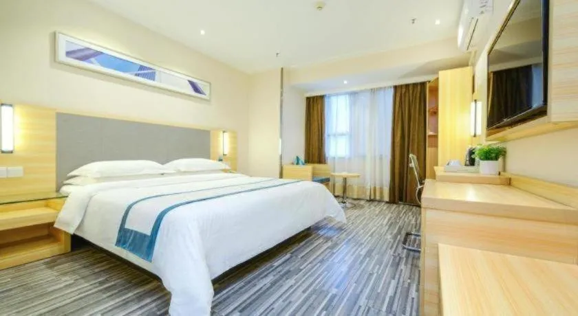 Bed in City Comfort Inn Meishan Sansu Temple