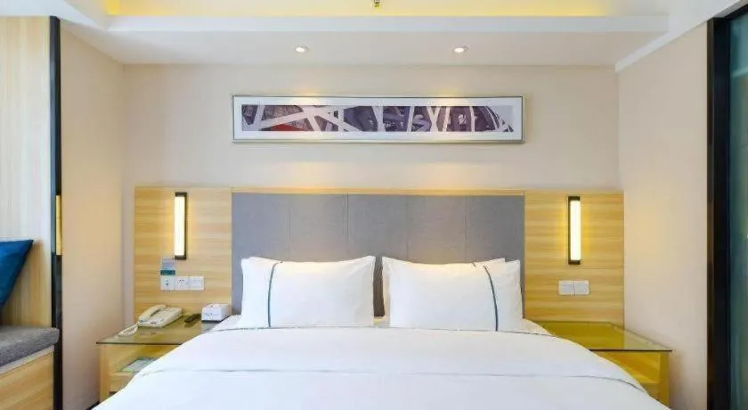 Bed in City Comfort Inn Meishan Sansu Temple