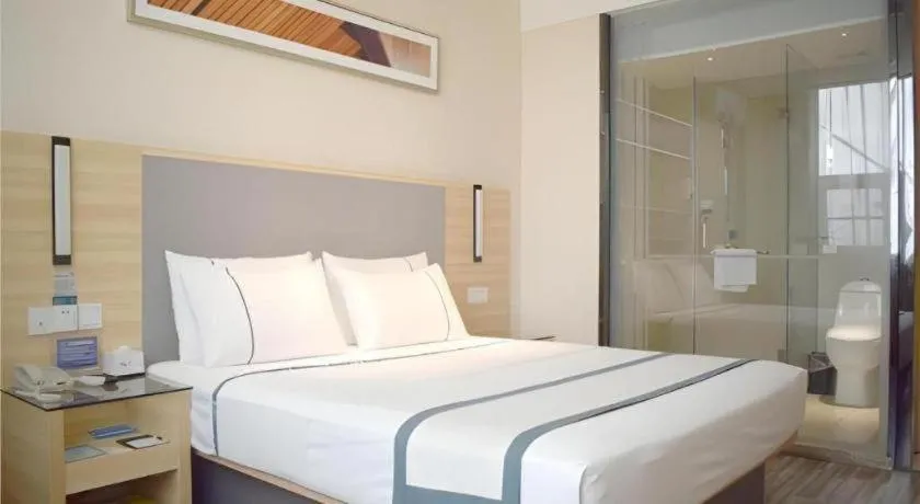 Bed in City Comfort Inn Meishan Sansu Temple