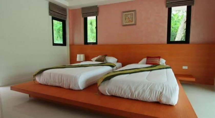 Bed in Phakawan Hotel