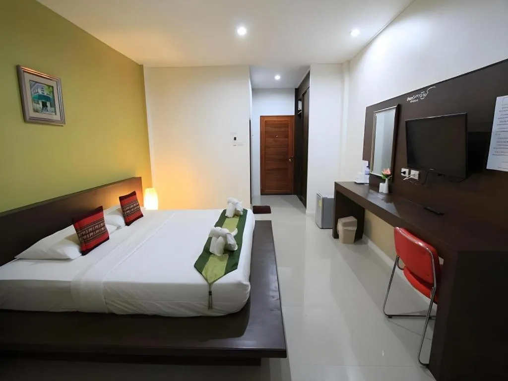 Bed in Phakawan Hotel