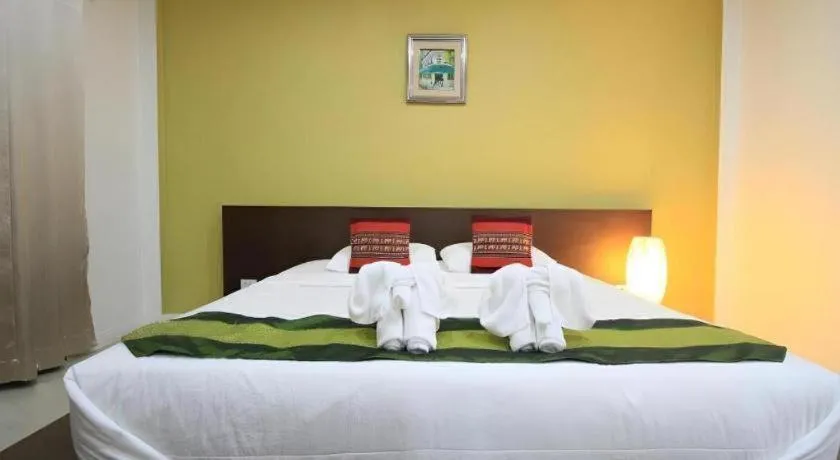 Bed in Phakawan Hotel