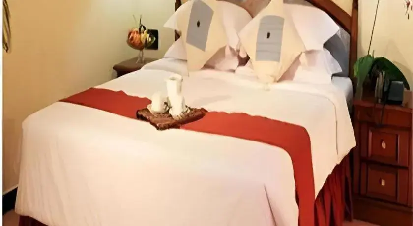 Bed in Sahid Kawanua Hotel Bed in Sahid Kawanua Hotel