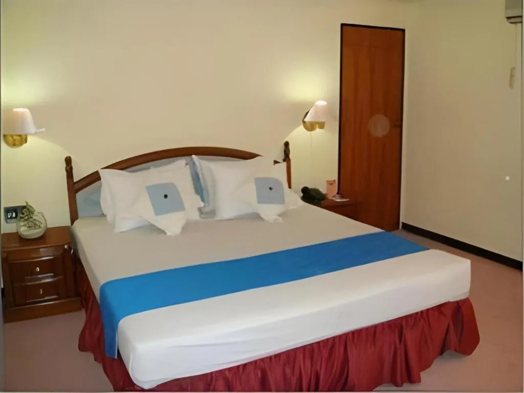Bed in Sahid Kawanua Hotel