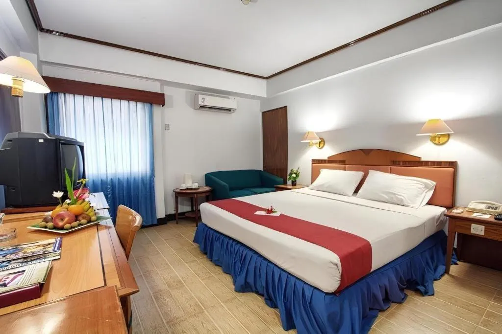 Bed in Sahid Kawanua Hotel