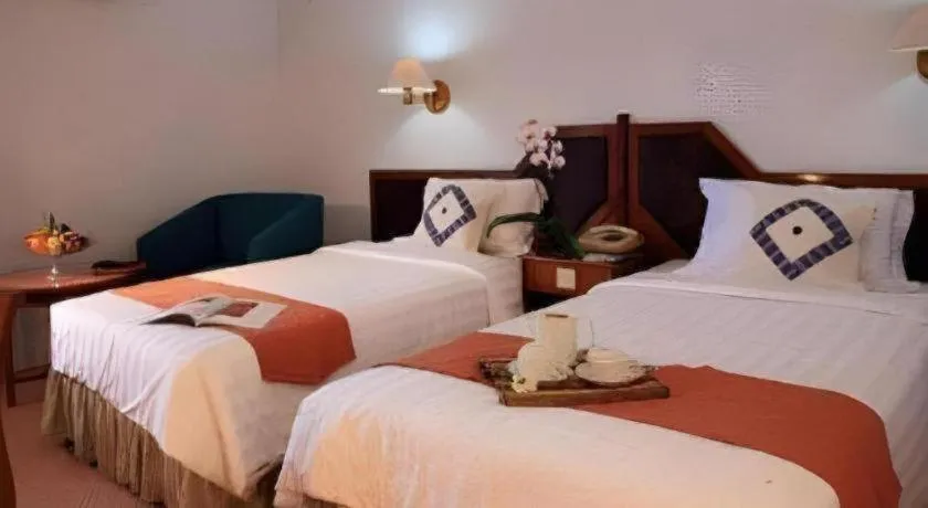 Bed in Sahid Kawanua Hotel