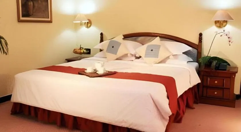 Bed in Sahid Kawanua Hotel