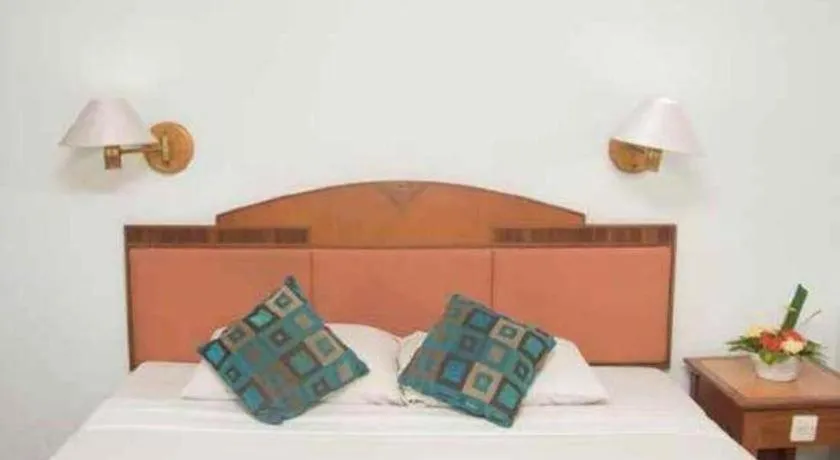 Bed in Sahid Kawanua Hotel