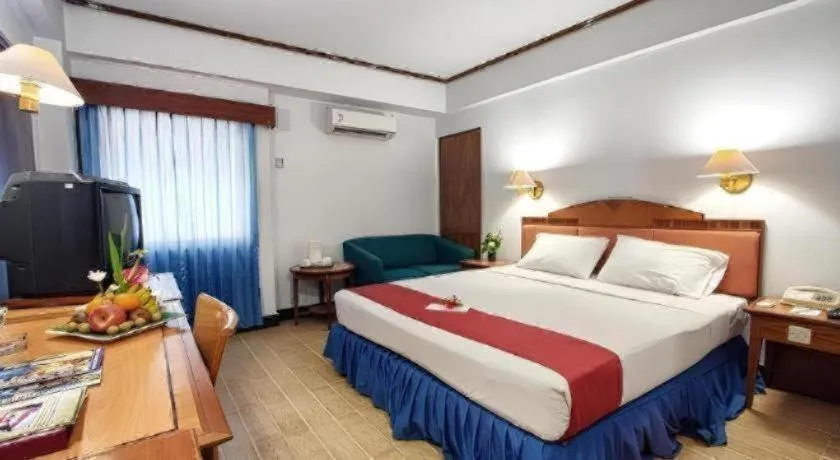 Bed in Sahid Kawanua Hotel