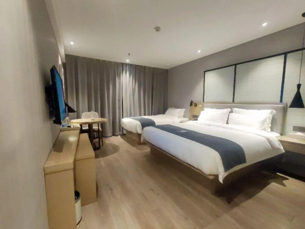 Bed in Echarm Hotel Nanchang Hongcheng Wangfujing