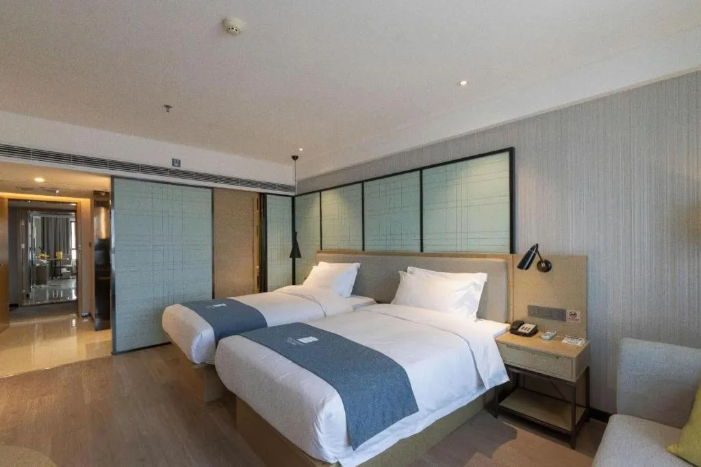 Bed in Echarm Hotel Nanchang Hongcheng Wangfujing