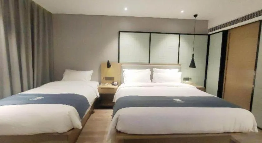 Bed in Echarm Hotel Nanchang Hongcheng Wangfujing