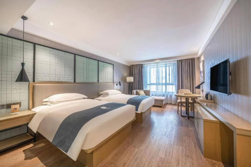 Bed in Echarm Hotel Nanchang Hongcheng Wangfujing