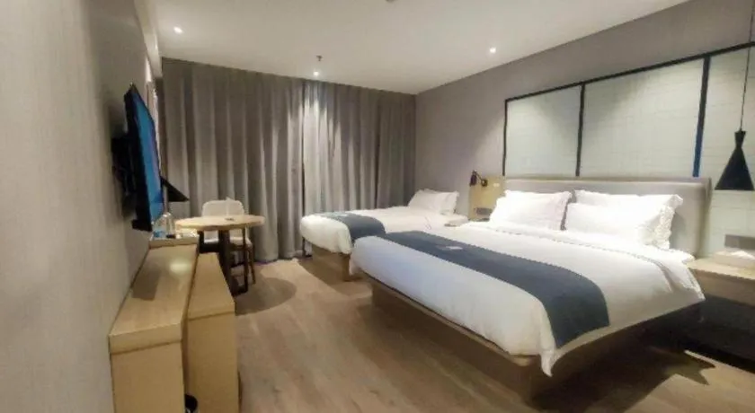Bed in Echarm Hotel Nanchang Hongcheng Wangfujing