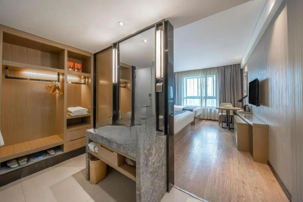 Bed in Echarm Hotel Nanchang Hongcheng Wangfujing