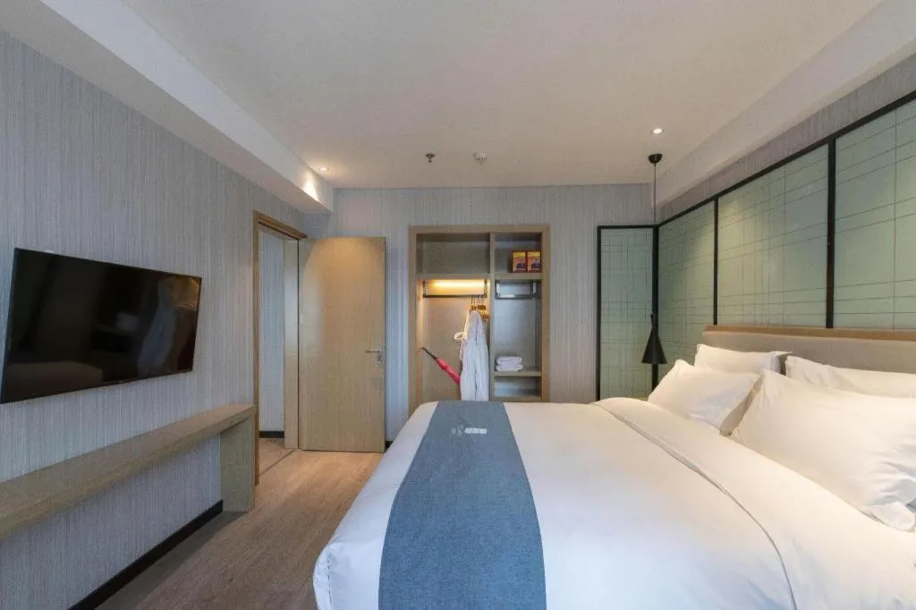 Bed in Echarm Hotel Nanchang Hongcheng Wangfujing