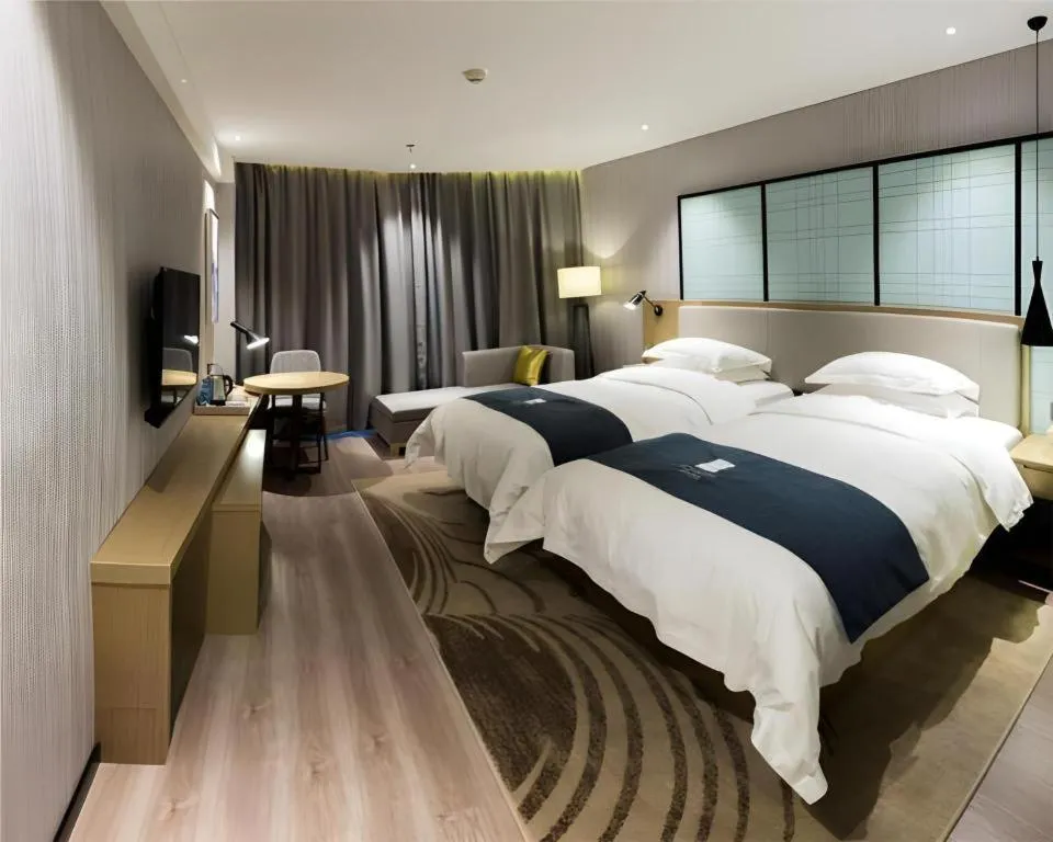 Bed in Echarm Hotel Nanchang Hongcheng Wangfujing